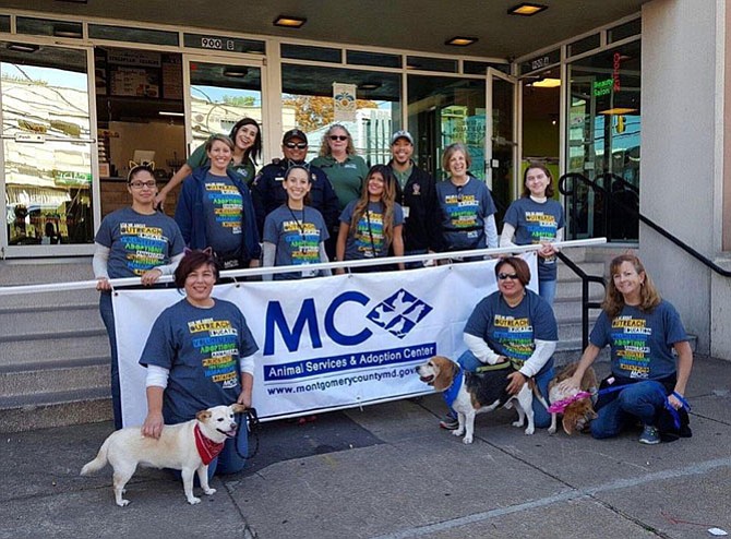 Montgomery County Animal Services and Adoption Center staff and volunteers at a Thanksgiving Day Parade.