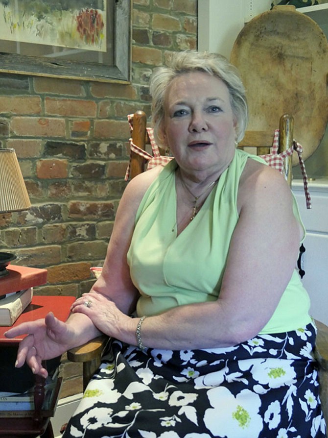 Ruthi Postow Birch sits in the den of her historic house on S. St. Asaph Street relating stories of her life in rural Alabama that inspire her recently-released memoir, “How to Build a Piano Bench: Lessons for Success from a Red-Dirt Road in Alabama.”