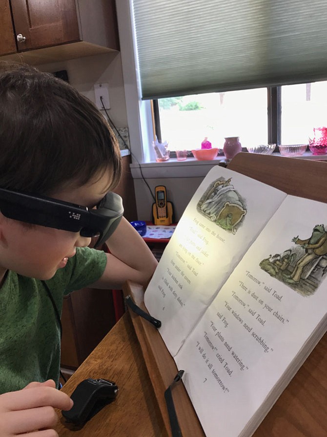 Felix Reges, 10 of Reston has a visual impairment. Regular eyeglasses do not correct or restore his vision, but with the magnification and freedom capacity of his NuEyes visual prosthetics, he can see to read and navigate at home and in school.