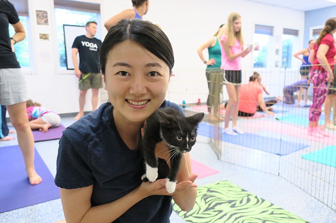 Shoko Tanno, who was visiting the area, came to kitten yoga to relax and enjoy interacting with the kittens.