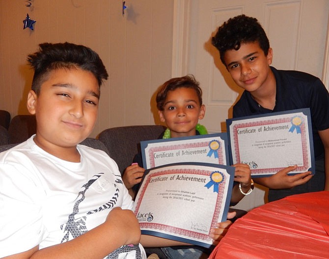 From left: Three Ragan Oaks attendees, Shahid Latif, Stephen Tatem and Mohammed Froukh with their academic-achievement certificates.