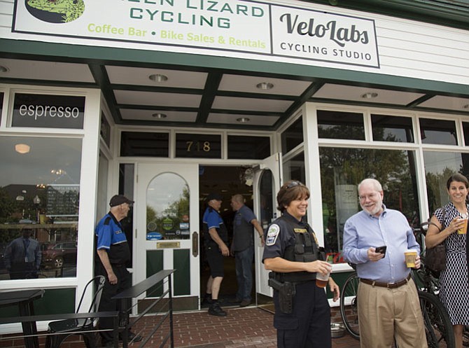 Herndon Police Chief Maggie DeBoard speaks to people outside of Green Lizard Cycling during a “Coffee with a Cop” event on Thursday morning, July 27.