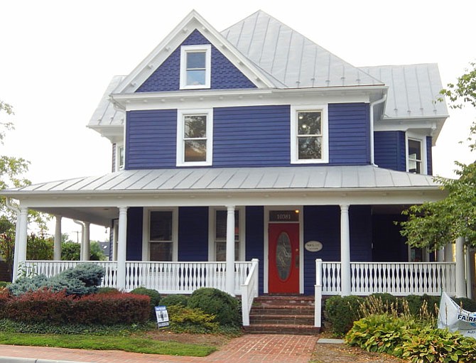 Constructed in 1892, this freshly painted building at 10381 Main St. houses The Quilt Patch and MJCI Inc., a design/build company. 
