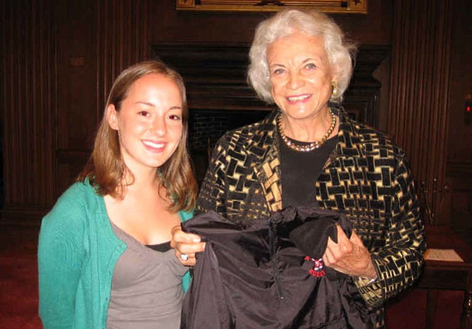 Morgan Findley, Herndon High School Class of 2008, kept this photograph of herself and Justice Sandra Day O'Connor, the first woman to serve on the Supreme Court of the United States. The photo was taken on a field trip Findley took part in as a student in Douglas Graney's political science class. "I will always be indebted and grateful [to him]," Findley writes to the Connection. Graney cites in his book that since he had met Justice O'Connor before this meeting, he was hoping she’d give him a big hello like they were BFFs, so the kids would be impressed. Instead, her first sentence was, "So, what do you kids want to talk about?"
