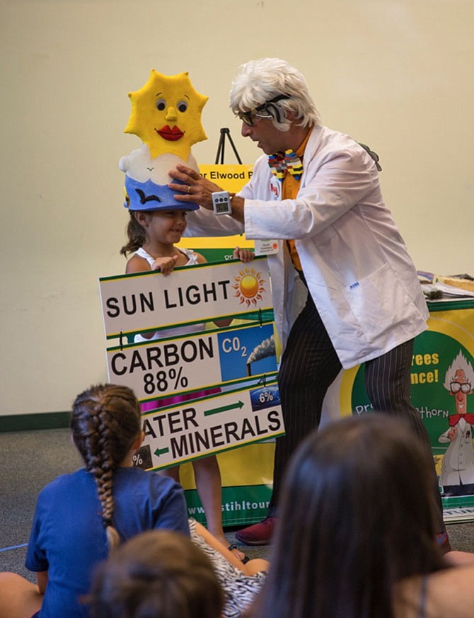 Canadian arborist Warren Hoselton as Professor Elwood Pricklethorn explains the value of trees to the environment.
