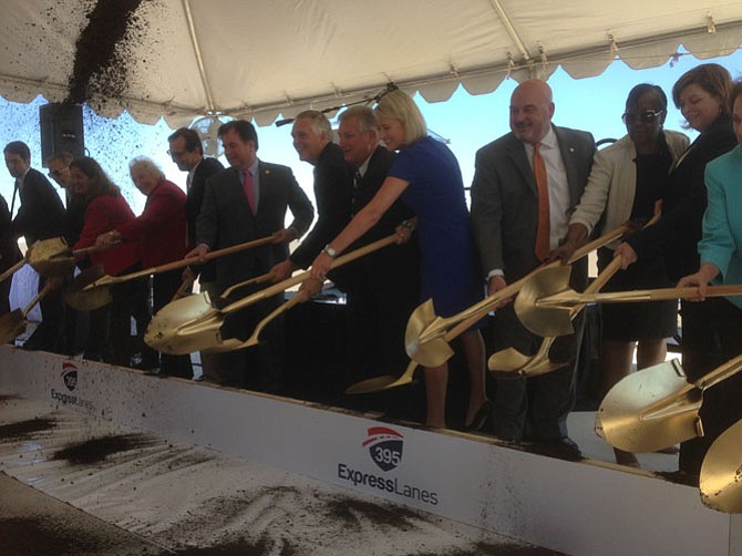 State transportation officials get out the golden shovels to kick the 395 Express Lanes project off.