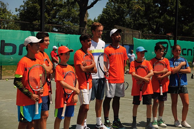 ATP "Next Generation” (the stars of the future tour) player, Danill Medvedev, 21, from Russia, is ranked number 48 on the ATP tour. During Family Day at the Citi Open tournament, he took time from his practice to hit with youths in the Tecnifibre clinic.
