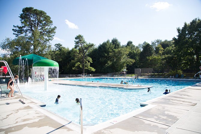 A wide shot of the Burke Centre Ponds Pool in Burke Tuesday, Aug. 8. This pool has zero-foot entrances  — a convenience for babies and toddlers to learn how to swim.