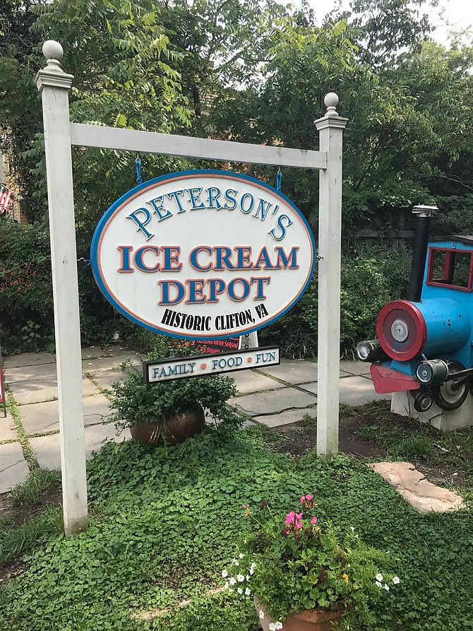 Peterson’s wooden sign is a popular photo opportunity.