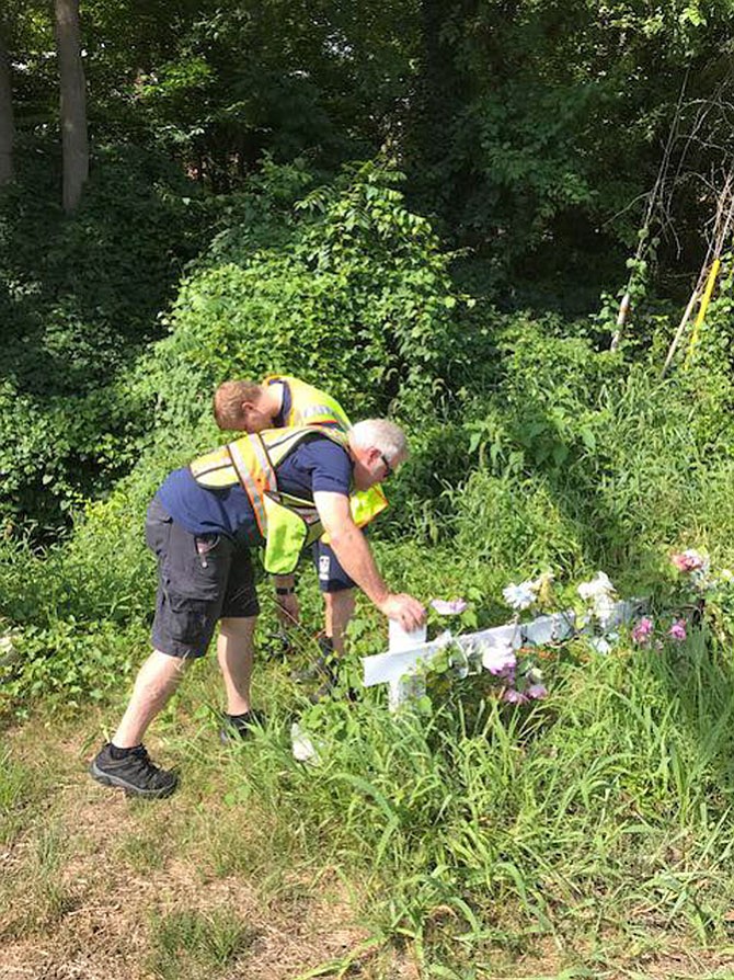 After passing by the memorial for the family killed in the fatal crash on Pyle Road of February 2016, Cabin John Park Volunteer Fire Department’s Sunday day crew decided to honor those lost by cleaning up the memorial. 