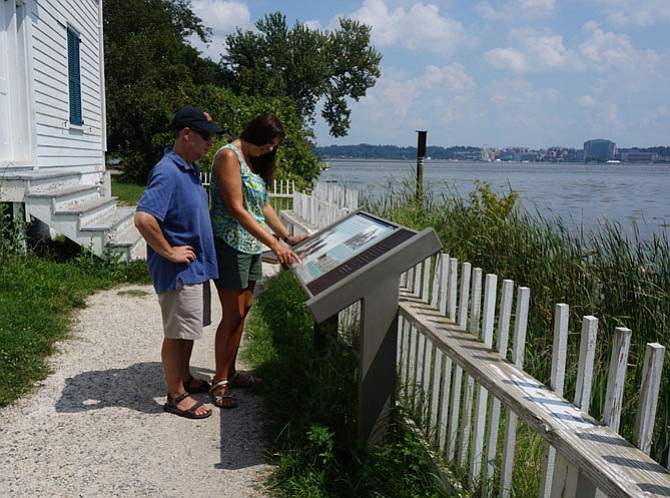 Richard and Elle Tauber of Scotia, N.Y., visit the lighthouse at Jones Point Park.
