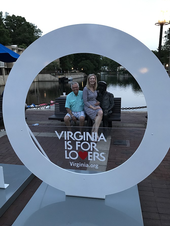 Jim and Karen Cleveland with Bronze Bob and the Virginia is for Lovers Traveling Sculpture.
