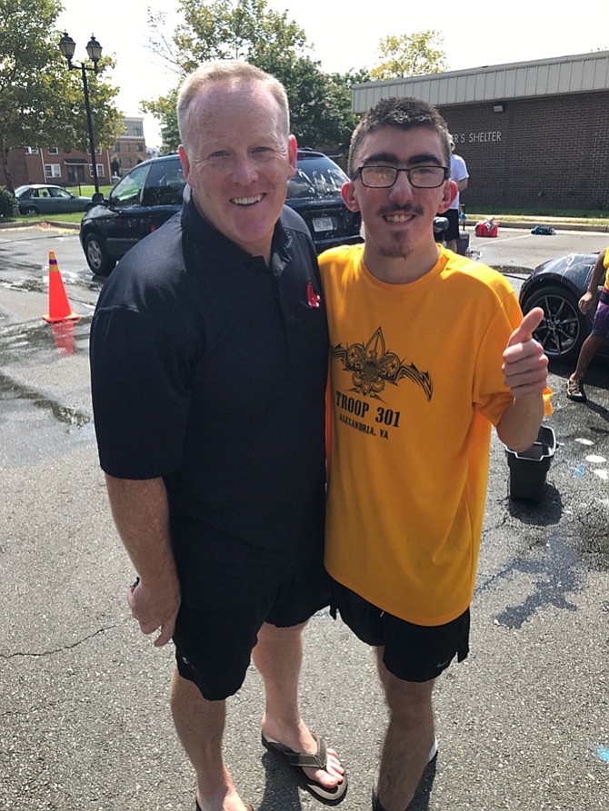 Former White House Press Secretary Sean Spicer with Boy Scout Jonathan Nearman.
