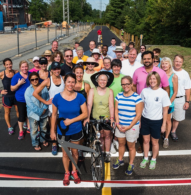 Mayor Laurie DiRocco, Councilmembers, and community members celebrate the opening of a widened and rerouted section of the W&OD trail near the community center, September 2016.