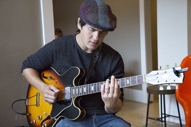 John Lee of Washington, D.C., plays the electric guitar at the Lake Anne Brew House. He regularly plays at Sotto, a subterranean jazz venue and cocktail bar in the District, Tuesdays from 8-11 p.m.