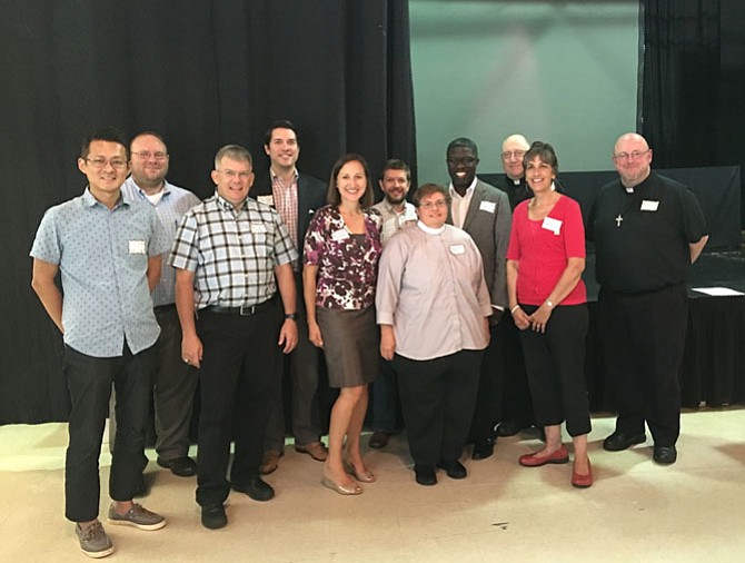 From left: Pastor Kyungsuk Cho, Wesly United Methodist Church; Rev. Dustin Parson Schwarz, Emmaus United Church of Christ; Pastor Jeff Haugh, Vale UMC; Pastor Austin Almaguer, Vienna Baptist Church; Rev. Kristin McBrayer, Emmaus United Church of Christ; Pastor Carl Sweatman, Antioch Christian Church; Rev. Jamie Samilio, Holy Cross Episcopal; Pastor CJ Cousins, Vienna Seventh Day Adventist; Rev. William Metzger, Our Lady of Good Counsel; Michelle Scott, ED Shepherd’s Center of Oakton-Vienna; and Rev. John Dolan, Our Lady of Good Counsel.