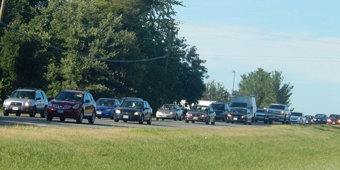 Vehicles head slowly south on the two-lane section of Route 28 in Centreville during the evening rush.
