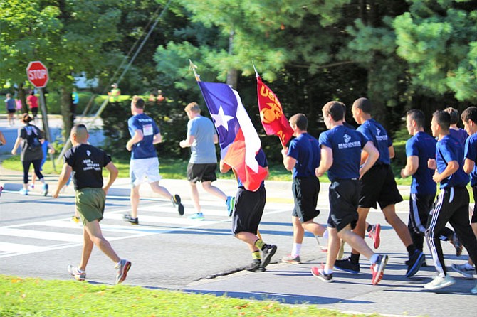 A Marine Corps ROTC Unit calls out cadence during the 9/11 Heroes Run.