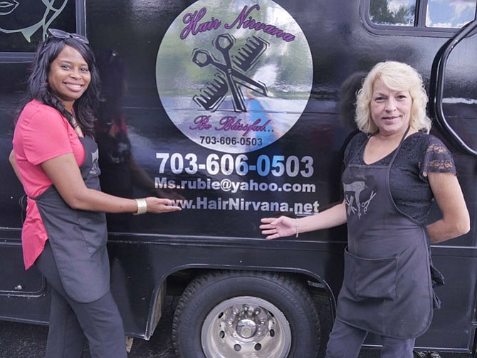 Ms. Rubie, owner/hairstylist at Hair Nirvana mobile hair salon on wheels with her assistant, Alycia Connor.