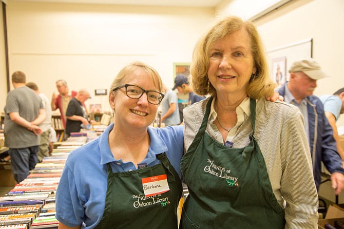 Barbra Hippe, Oakton resident and President of the Friends of Oakton Library, and Tooley Milstead, Book Sale Co-Chair, were in charge of the all-volunteer led Fall Book Sale at the Oakton Library Wednesday, Sept. 13. 