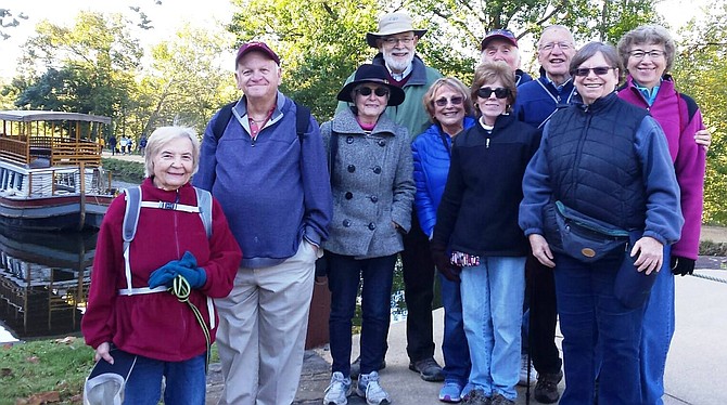 Members of the Potomac Community Village participated in a walk on the C&O Canal earlier this year. Such walks are part of the programs offering social connections for members, including (from left) Barbara Kolb, Vic Cohen, Valen Brown, Don Moldover, Phyllis Weltz, Marla Cohen, Al Weltz, Barry Taylor, Sheila Moldover, and Sheila Taylor.