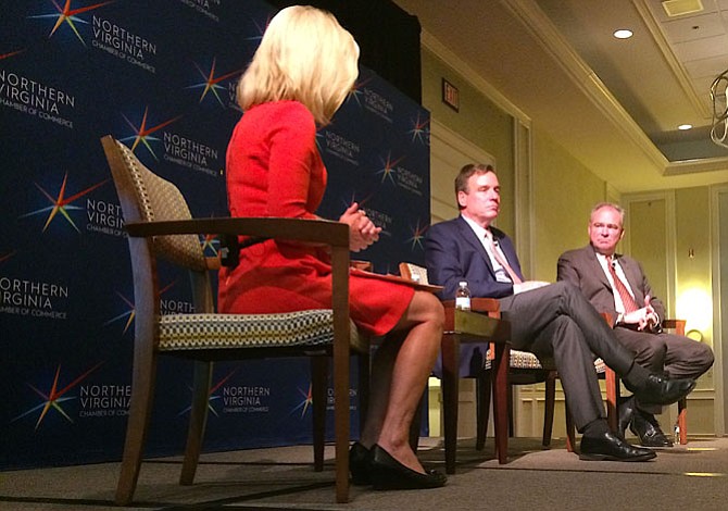 Julie Carey of NBC4 moderates a discussion between U.S. Sen. Mark Warner and U.S. Sen. Tim Kaine at the Falls Church Marriott Fairview Park.