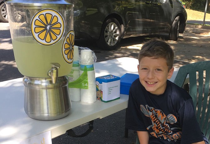 Ethan Schnall sold out of his lemonade on Sept. 24, collecting $50 in two hours for hurricane victims.
