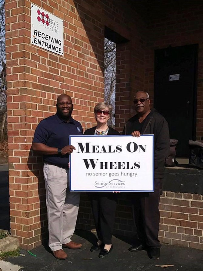 Senior Services of Alexandria executive director Mary Lee Anderson, center, delivers Meals on Wheels with City Councilman John Chapman and past SSA board chair Lynnwood Campbell. Meals on Wheels is one of many services available to seniors living in Alexandria.