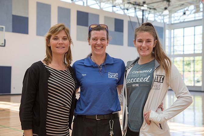 From left: Leslie Herman, Vienna resident and director with Vienna Parks and Recreation, with Terri Tufano, senior at Centreville High School, and her mother Terri Tufano, custodian, at the newly renovated Vienna Community Center Wednesday, Oct. 4. 
