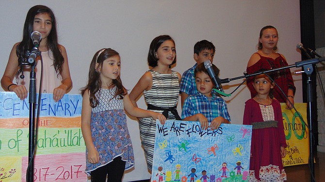 Members of the Bahá’ís Children's Class of Fairfax sing songs.