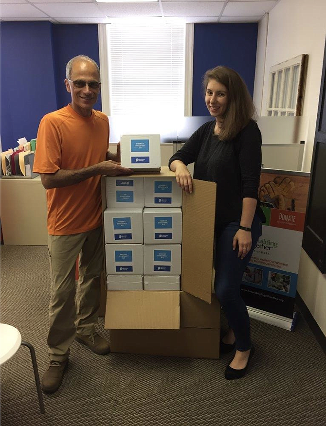 Director of Programs Haig Paul and Outreach Manager Breanne Driscoll of Rebuilding Together Alexandria, in partnership with Dominion Energy, will deliver 100-plus energy efficient kits to city residents this year.
