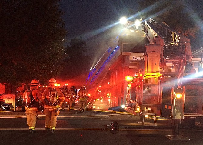 Firefighters at the scene of the Nov. 2 blaze at Exotica Florist in Old Town Fairfax.