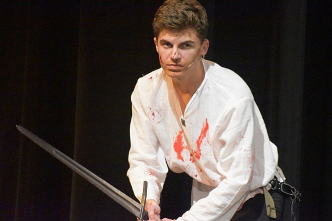 Nick Hovis in Madison High School’s production of “Macbeth.”  