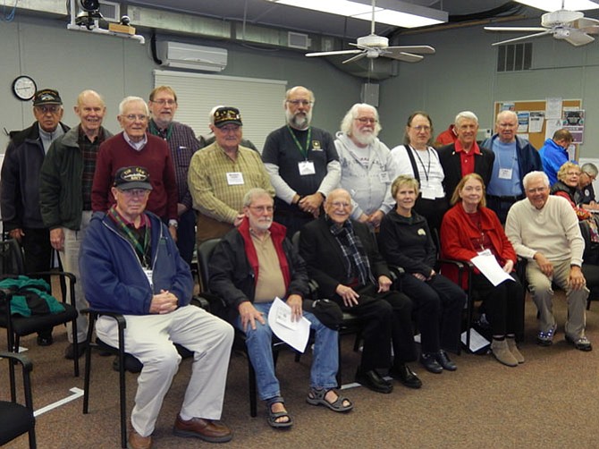 The military veterans attending OLLI’s annual ceremony honoring them pose for a group photo.