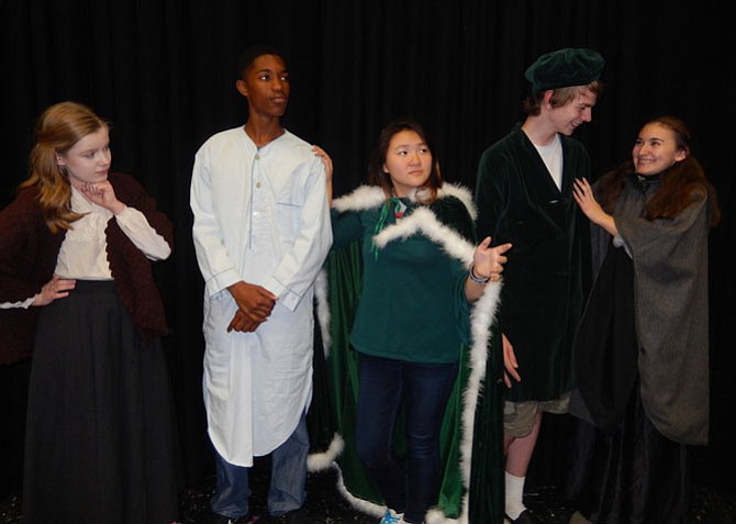 From left: Anna Krelovich, Jalin Dew, Faith Cho (Ghost of Christmas Past), Wade Parker and Nora Lewis rehearse a scene.