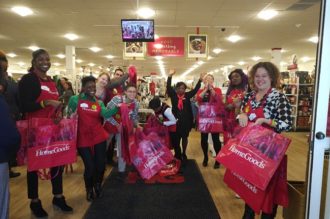 Employees greet shoppers at the opening of the new HomeGoods store at Potomac Yard Nov. 16.