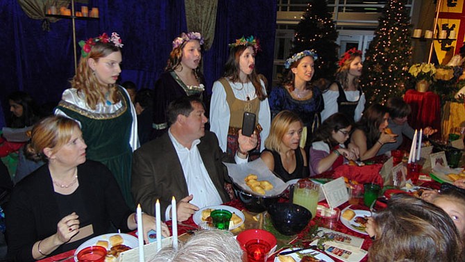 Madrigals at Langley High School serenade guests during the Renaissance Feaste.