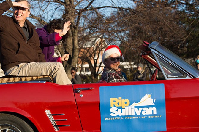 Del. Rip Sullivan (D-48) and his wife Beth Sullivan ride in Bob Coates’s Ford Mustang in the ninth annual Winterfest parade in McLean on Sunday, Dec. 3. 
