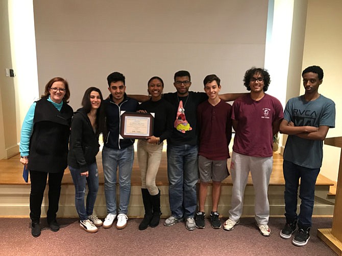 Winning team from T.C. Williams, along with Friends Board President Suellen Savukas, Phoebe Tomsu, Abdul Khan, Anyah Wells, Leon Story, Ian Birchler de Allende, Guarav Bhanot, and Essey Tesfay.