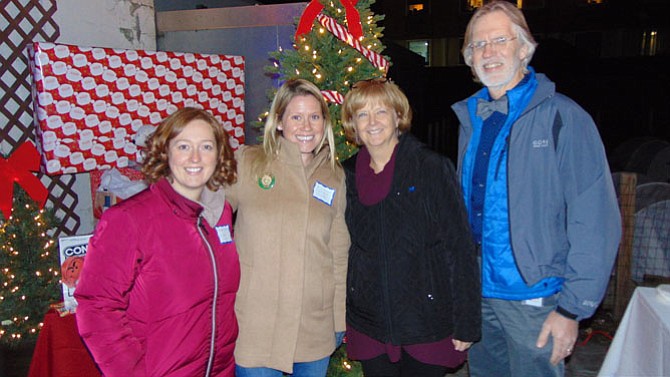 At the Hollin Meadows Elementary School PTA's Happy Hour Toy Drive event on Thursday, Dec. 7 at DRP - Del Ray Pizza are (from left): Elizabeth Richardson, Erin Anderson, School Counselor Deb Storck, and Principal Jon Gates.