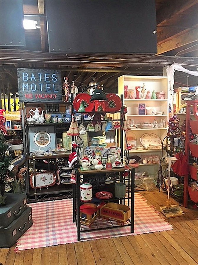 Dealer booth at Mount Vernon Antique Center has a selection of holiday items and other gift items.