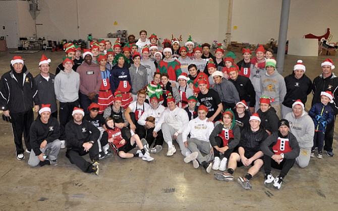 Westfield High Varsity Football Coach Kyle Simmons and his newly crowned State Championship team helped ONC move into its warehouse last week in preparation for this year’s gift packaging and deliveries.