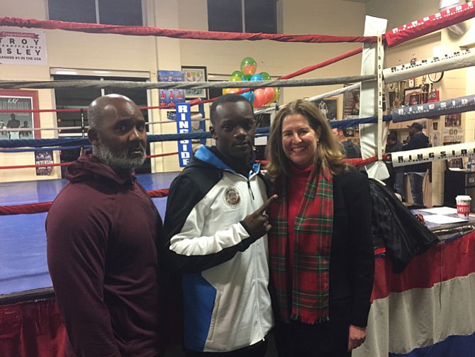 Kevin Johnson (left), his son Troy Isley (center) and Mayor Allison Silberberg.