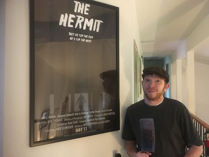 Nate Schrader with a bloodied meat cleaver was one of the creators behind “The Hermit,” an award-winning slasher movie that was filmed in the Centreville-Chantilly area.