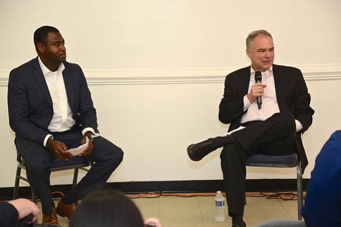 Kofi Annan, president of the Fairfax County NAACP, moderates the Town Hall-style conversation with U.S. Sen. Tim Kaine (D), in a community room above Giardino Italian Restaurant in West Springfield.
