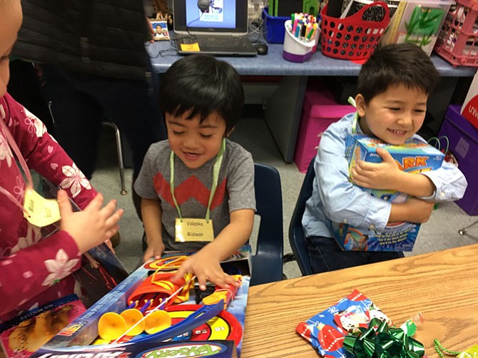 Children were so happy with all their gifts that they held onto them tightly, thankful for what was in front of them.