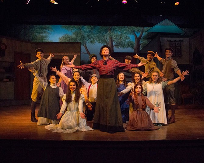 Miss Stacey (Elizabeth Colandene; front center) takes her students on a field trip in LTA's production of "Anne of Green Gables."
