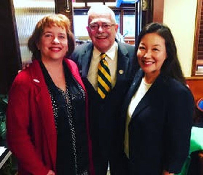 U.S. Rep. Gerry Connolly (D-11) (center) pictured with Herndon Town Councilmembers Sheila Olem (left) and Grace Wolf Cunningham (right) at the Dulles Area Democrats breakfast held Monday, Jan. 22. While there he spoke about the Government shutdown 2018 and the 2018 midterm elections.
