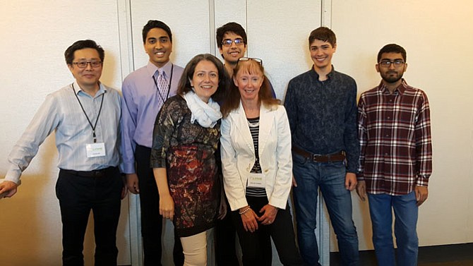 Dr. Alessandra Luchini and her Lyme Innovation Team were awarded $5,000 to help kickstart their winning concept for a Lyme diagnostic. The team includes (front row, from left): Luchini and Deborah Hoadley; (back row, from left): Charles Ma, Tej Ganti, Ather Adnan, David Donna, and Adil Akif. 