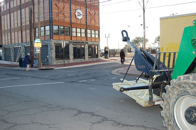 A forklift carrying the ODBC anchor approaches the club’s new facility on Strand Street.